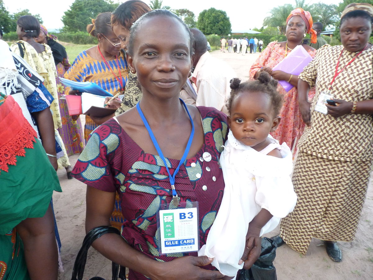 Woman holds baby in Africa