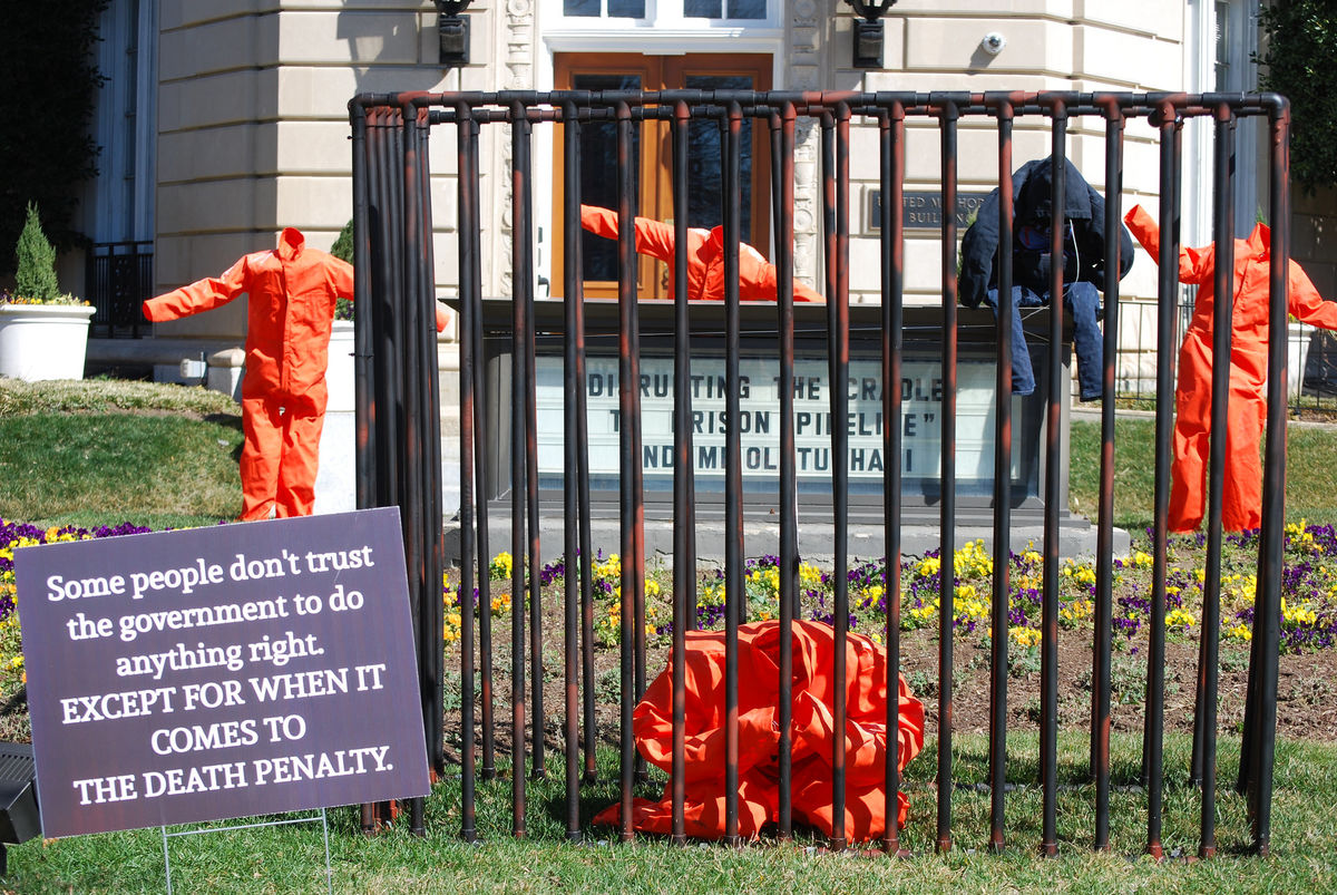 An art installation outside the United Methodist Building highlighting the cradle to prison pipeline.