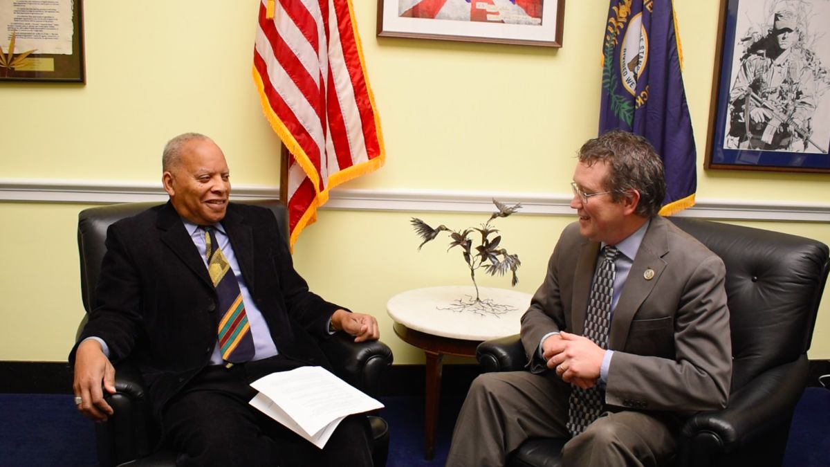 Harrison and Massie sit opposite each other in Massie’s Capitol Hill office.