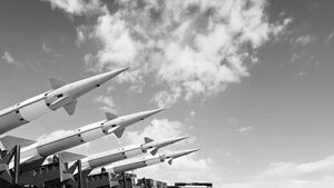 Black and white photo of nuclear weapons pointing toward the sky