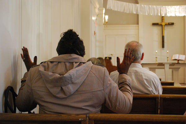 Lifted hands in prayer