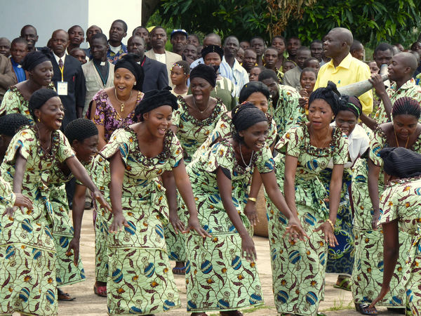 African women welcoming visitors with dance
